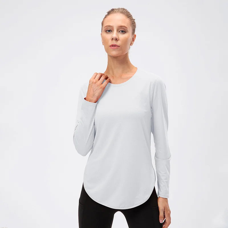 Camiseta Fitness, Proteção Solar UV 50+, Manga Longa, Moda Esportiva, Conforto e Estilo, Treino Ao Ar Livre, Tecnologia UV, Roupa Respirável, Look Fitness, Alta Performance, Secagem Rápida, Movimento Livre, Estilo Casual, Moda Feminina, Proteção e Conforto, Maluh Fit.